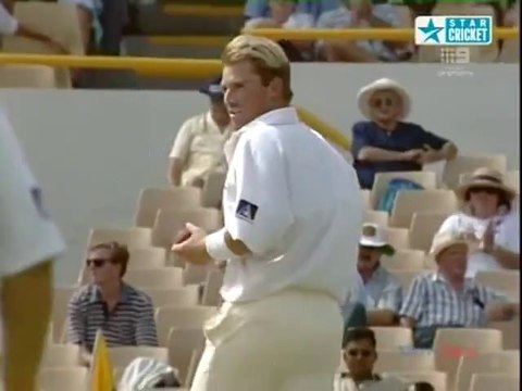Shane Warne bowls a bouncer to Brian Lara