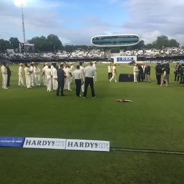 RoW XI players receiving their medals.