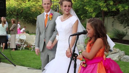 Little Sister sings Frozen Love Is An Open Door at wedding