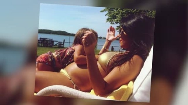 Kourtney Kardashian Flaunts Her Baby Bump in a Bikini