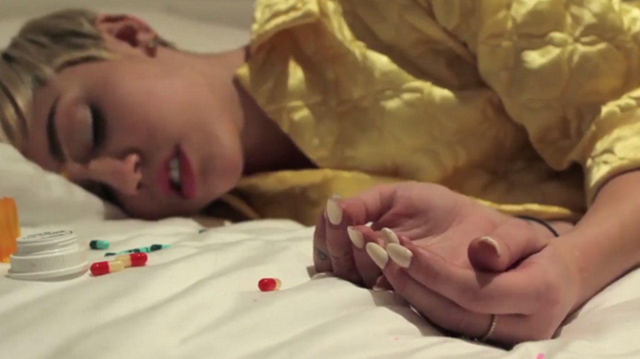 Miley Cyrus Is Drugged Out in Super Weird Video with the Flaming Lips