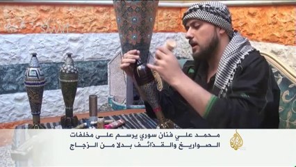 فنان سوري يرسم على مخلفات الـصواريخ