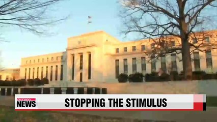 U.S. Fed sets October as end of bond buying program