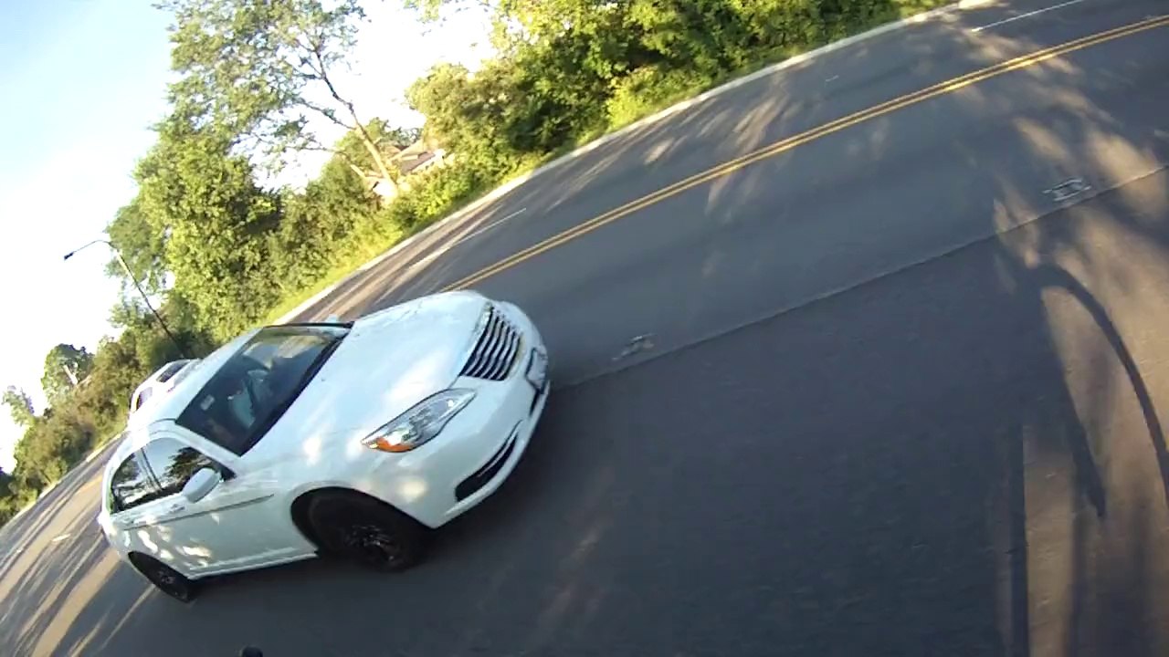 Cyclist teaches angry driver a lesson.