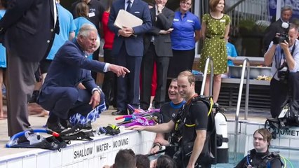 Prince William demonstrated his buff credentials in chilly swimming pool