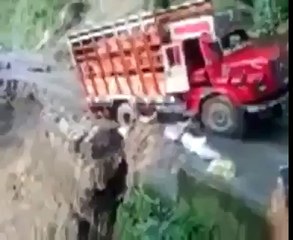 truck is falling down from a hilly road.