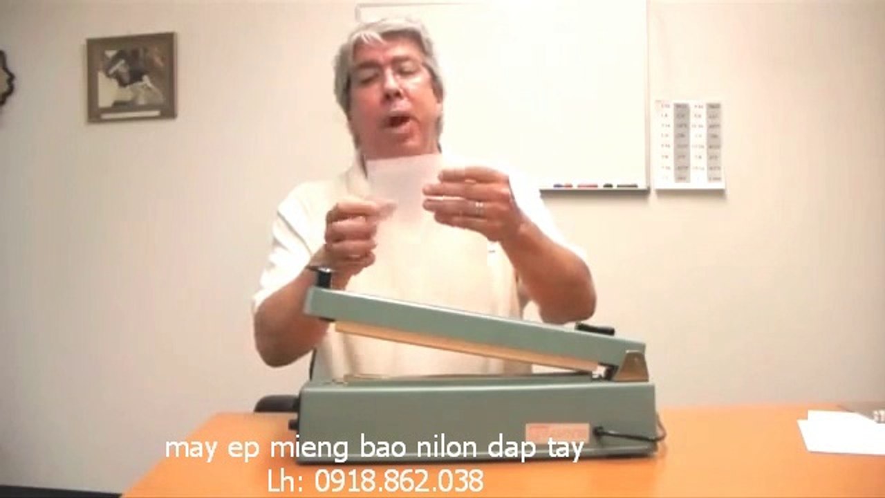 máy hàn mép túi dập tay, máy ép miệng bao nilon dập tay Sf400