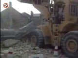 Prisoner escaping from jail using a bulldozer to destroy a wall! Insane...