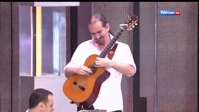 Solo de guitare électrique joué avec une guitare sèche