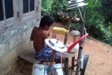Kid Couldnt Afford A Drum Kit So He Made One Himself