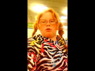 Girl at Retail Store Records Herself on Tablet