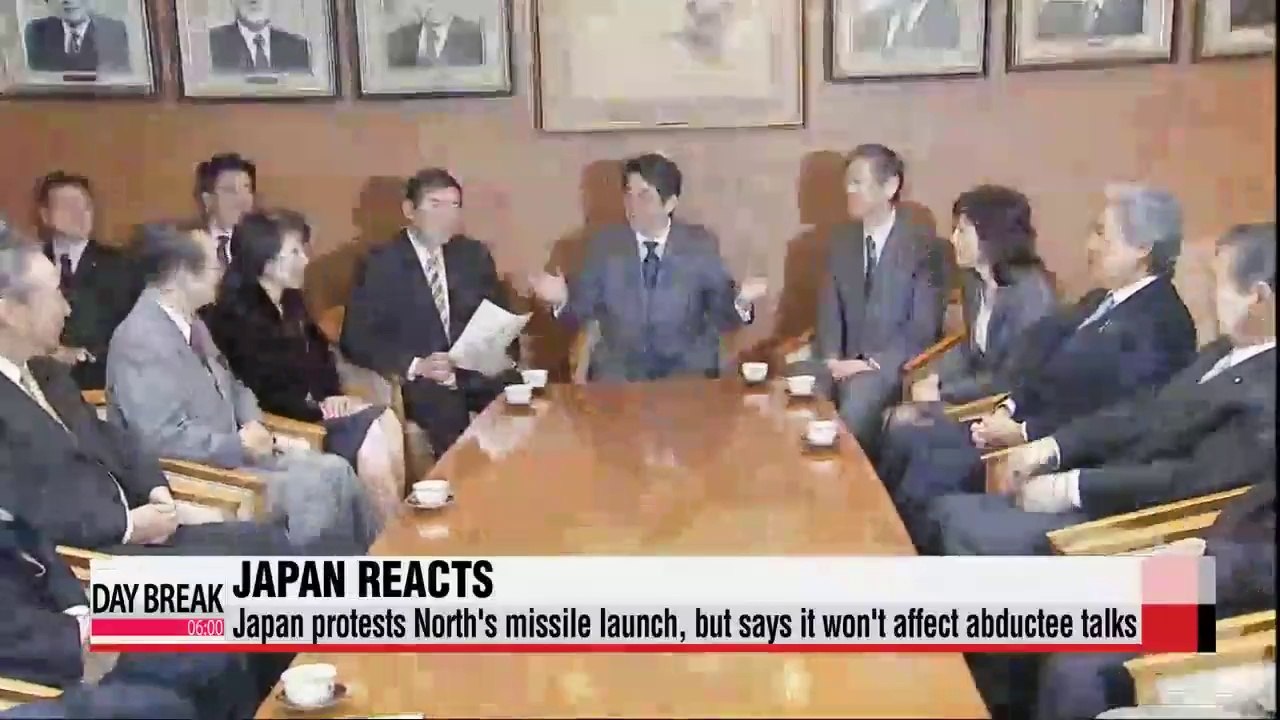 Japan protests North's missile launch, but says abductee talks will go on