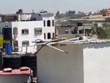 Israel Mortar Hitting Roof of Gaza Building To Warn of imminent Israeli Strike
