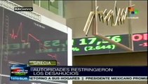 Griegos adeudan 77 mil millones de euros a bancos