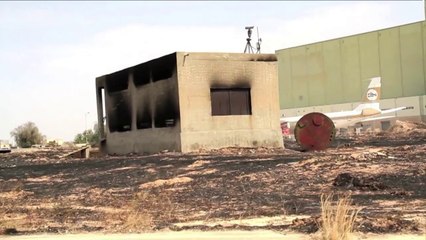 Libya's main airport closed as rival militias clash