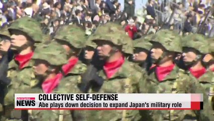 Abe defends new Japan defense policy (2)