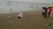 Freak storm sends Russian beach goers screaming for cover