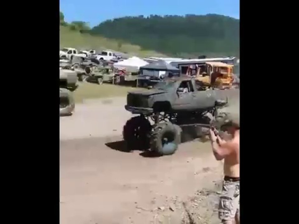 monster truck jump into mud