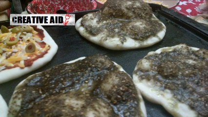 طريقة عمل عجينة البيتزا والمناقيش