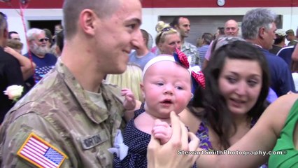 Maine Soldier Matt Norton meets his daughter for the first time after returning from overseas.