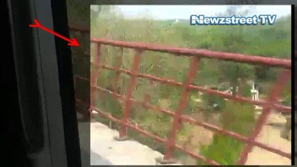 Metro train runs with doors open