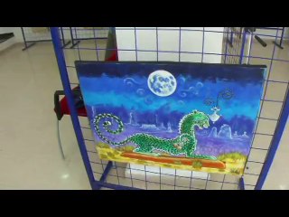 Canal Algérie en train de filmer le reportage de l'exposition "Des masques sur les couleurs"