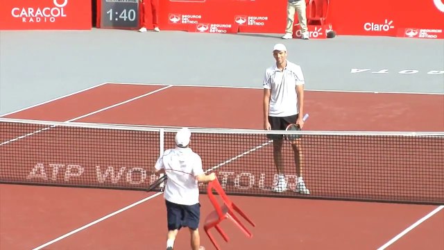 So funny tennis player... Too little to hug his opponent!