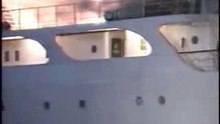 SHIP UNDER BRIDGE