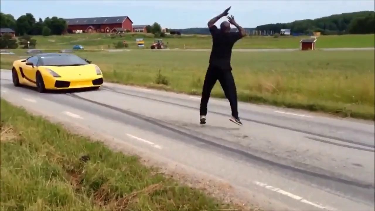 Real Superman jumps over lamborghini at 130kmphReal Superman jumps over lamborghini at 130kmph