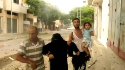 At least 40 dead in Israeli attack on Gaza district - medical officials