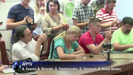 Trem com corpos do voo MH17 segue para Kharkiv