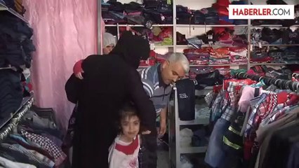 Suriyeli yetimlere elbise yardımı -