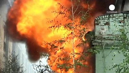 Ukraine MPs come to blows while fighting rages in east