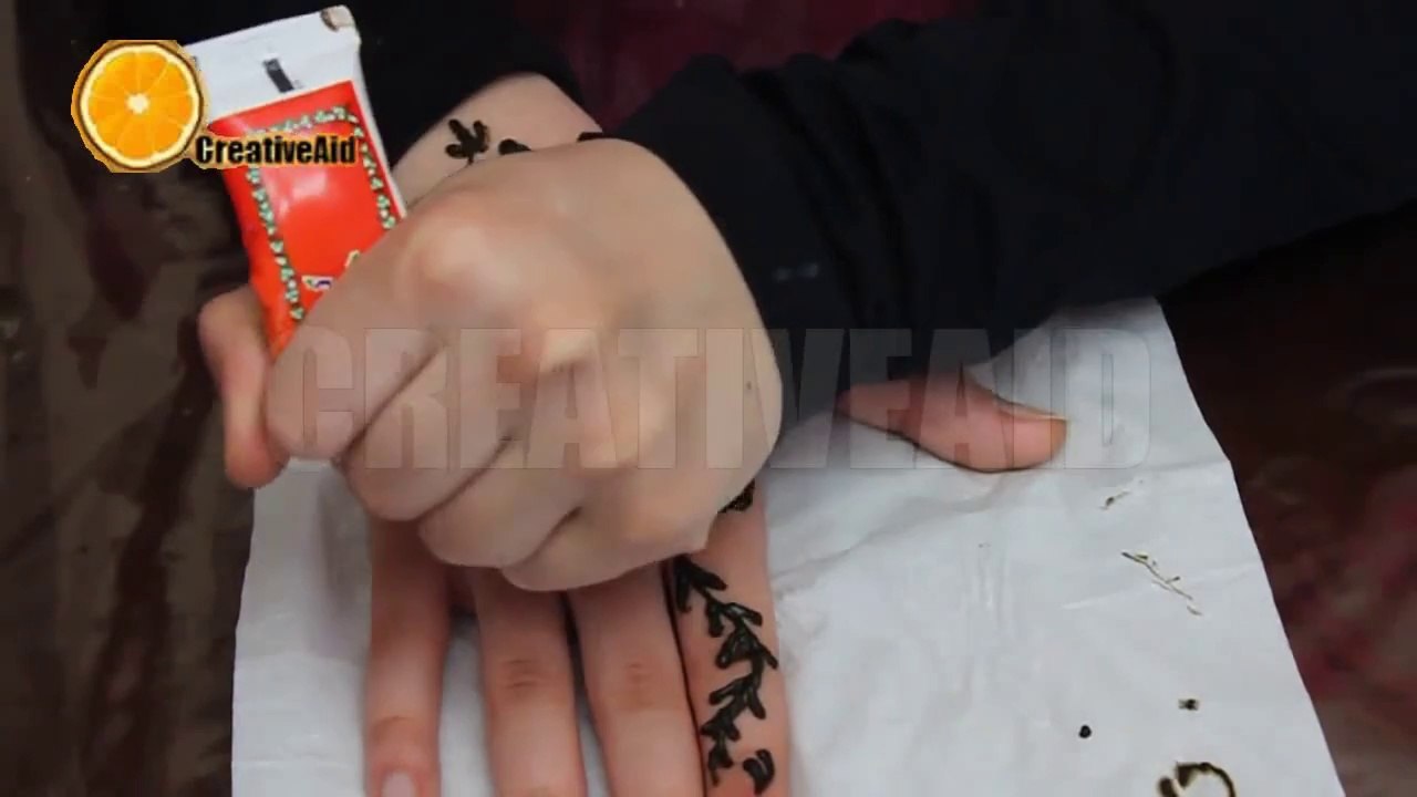How To Draw Henna Design _ تعلمي أجمل طريقة لنقش الحناء على يديك الحلقه١