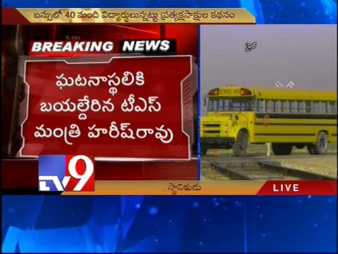 Train hits school bus at unmanned level crossing