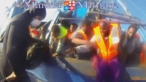 Footage shows rescue of 620 migrants from a small boat