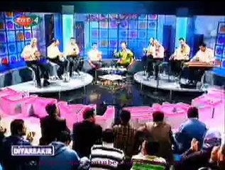 Yıldıray ÜNEŞİ-Ada Sâhillerinde Bekliyorum (Türkçe-Arapça)