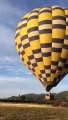 Watch Hot Air Ballooning Lift Off with Balloons Above the Valley