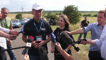 OSCE monitors examine wreckage of MH17 flight
