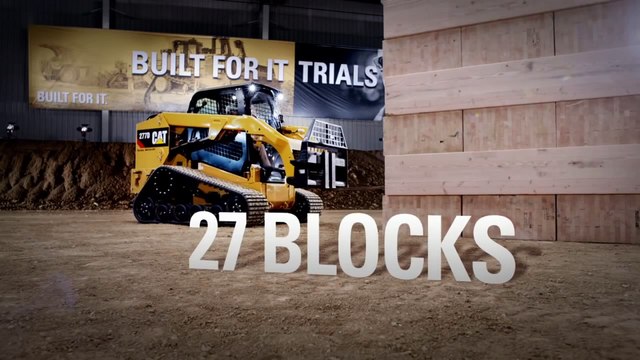 Deux pelleteuses jouent au Jenga