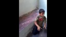 An Israeli girl is beating palestini kid who is taken by Israeli soilders