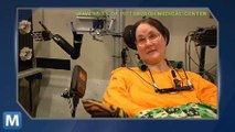 Woman Controls Robotic Arm with Her Brain