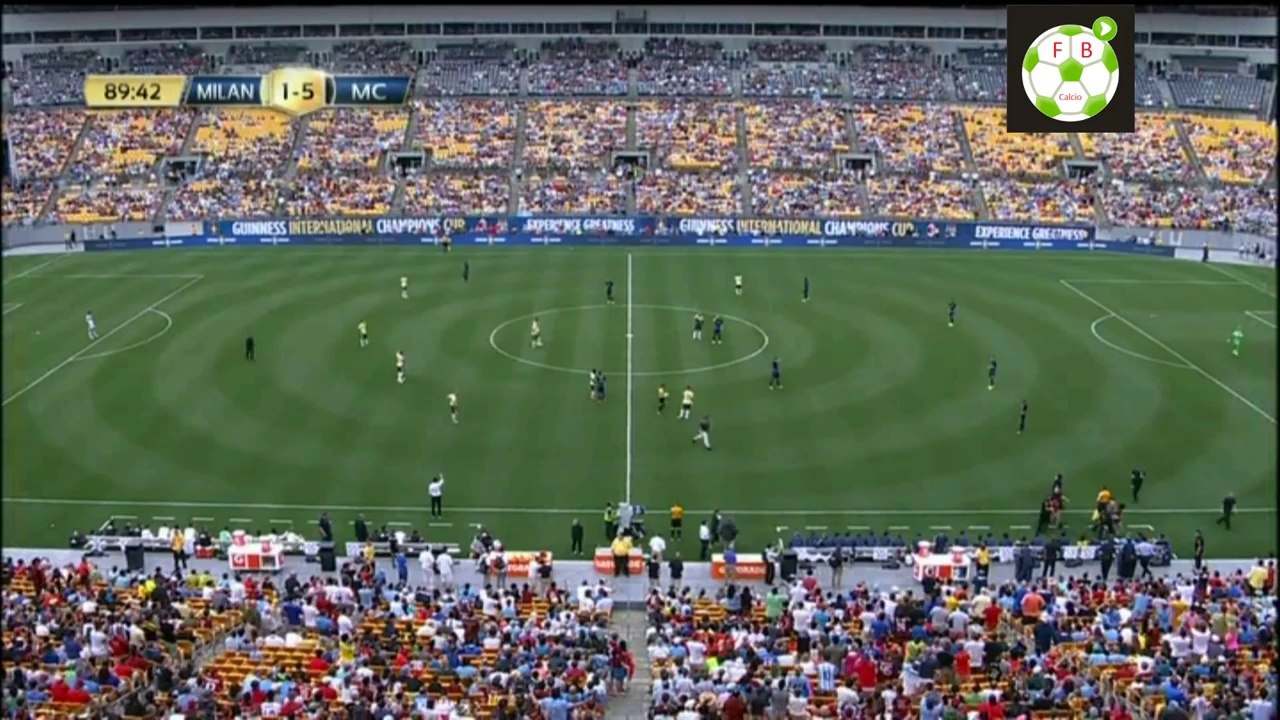 Two soccer fans invade the field to pose with Mario balotelli ! Hilarious