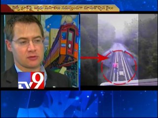 Women narrowly escape death on railroad tracks