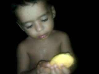 funny mango eating baby