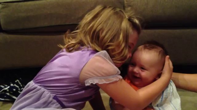 Little girl crying because her little bro is growing