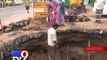 Yawning potholes and pits riddle Ahmedabad roads   Tv9 Gujarati