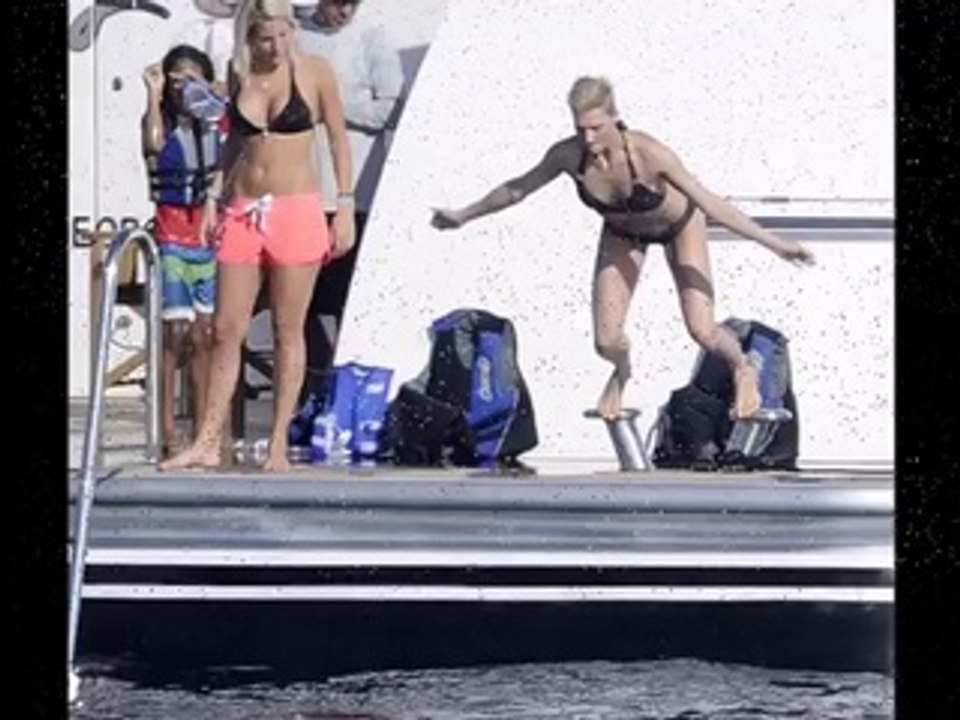 Seal gets cosy with his new bikini-clad girlfriend on a yacht in Sardinia