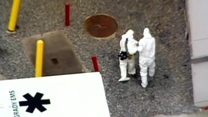 American doctor infected with Ebola arrives in U.S.