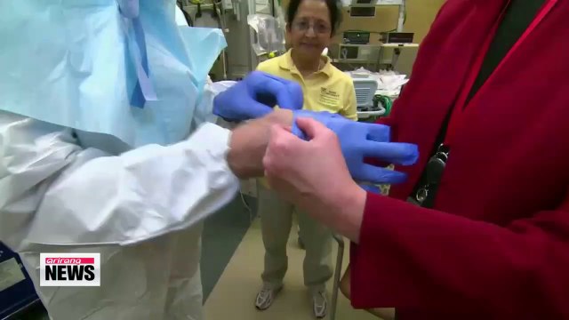 Two Americans infected with Ebola likely improving from secret serum